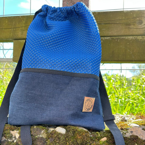 Mochila Azul Océano "La Tierra Tiene Fiebre"