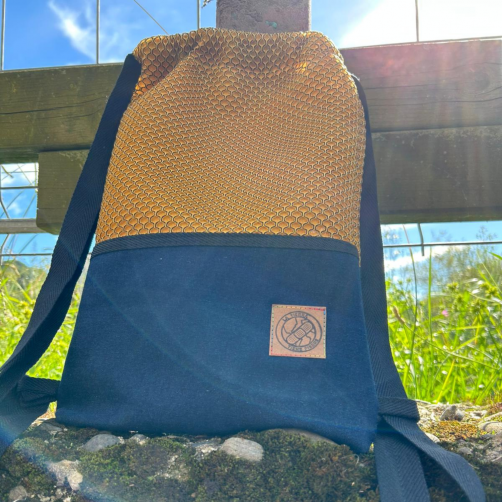 Mochila Naranja "La Tierra Tiene Fiebre"